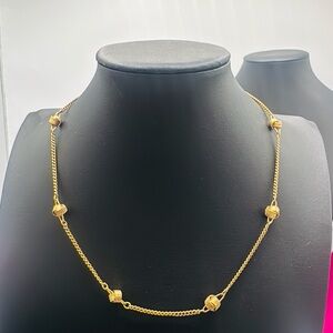 Avon gold tone station necklace.  Vintage 1970’s.